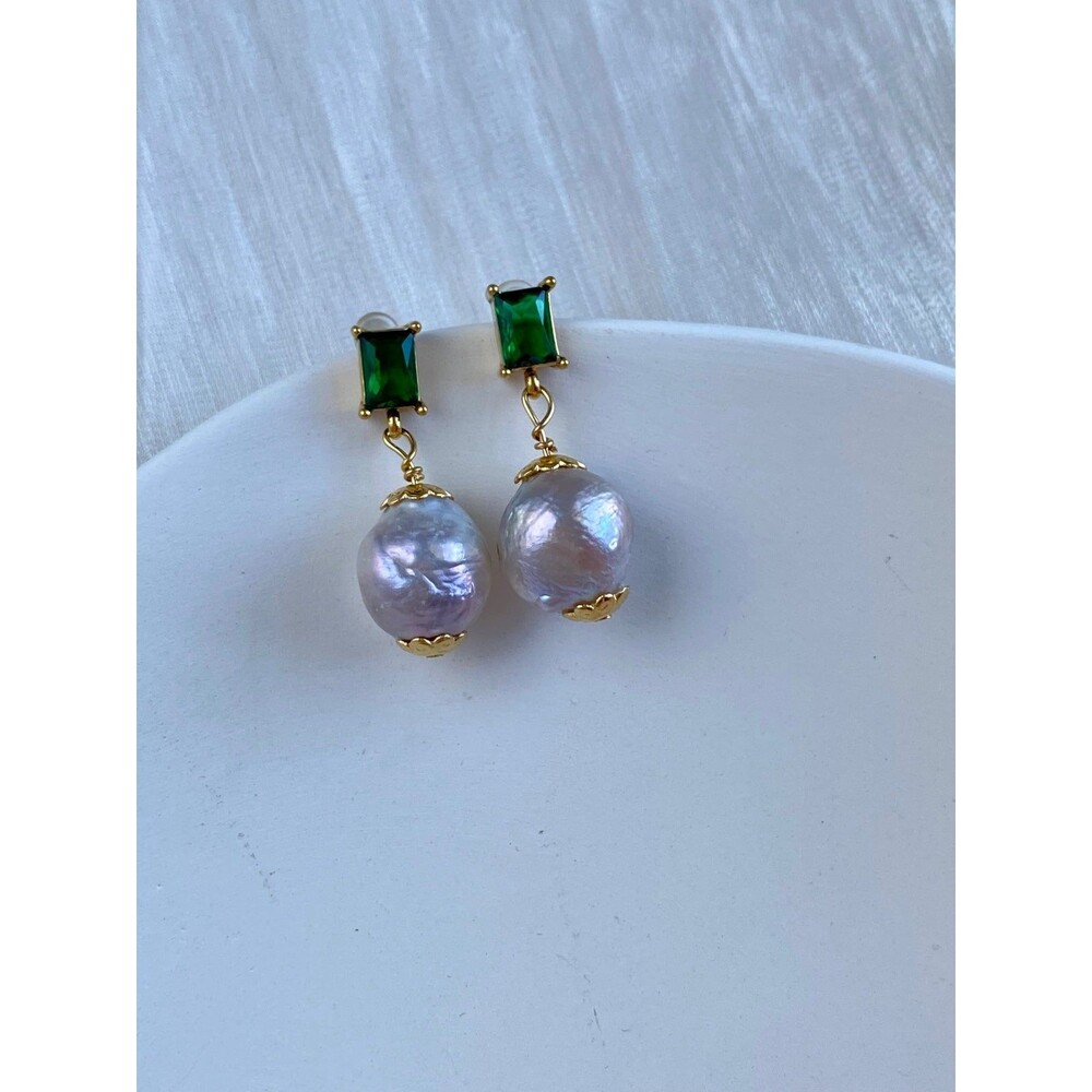 Huge baroque pearls with green zircon